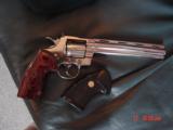 Colt Python 8" bright nickel 1980, custom Rosewood grips & original grips, 37 years old, looks great,357 Magnum,heavy vented rib,smooth action
- 8 of 15