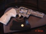 Colt Python 4" stainless,deep hand engraved & polished by Flannery Engraving,30 years old,bonded Ivory grips,a masterpiece i of a kind !! - 2 of 13