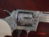 Colt Python 4" stainless,deep hand engraved & polished by Flannery Engraving,30 years old,bonded Ivory grips,a masterpiece i of a kind !! - 4 of 13