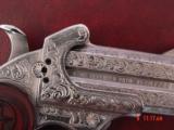 Bond Arms 410/45LC,fully engraved & polished by Flannery Engraving,2 shots,rosewood grips,nib,awesome work of art hand cannon
!! - 3 of 15