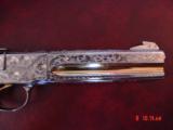 Colt Woodsman Match Target,master engraved by Brian Mears,nickel with 24K accents,real ivory grips,1957,22LR,6",awesome work of art.60 years old
- 5 of 15