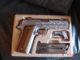 Coonan Arms 357 magnum, model "B" 5", fully engraved by Flannery Engraving, wood grips, 1982, box,manual etc. awesome rare 1 of a kind
- 7 of 15