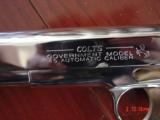 Colt Government 1911,Series 80,just fully refinished in bright nickel,& 24k gold accents,2 mags,Pearlite grips,never fired,box,manual,etc.awesome gun
- 6 of 12