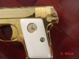 Colt Vest
Pocket 1908 25 cal, hammerless, just refinished in bright 24K gold plating,bonded ivory grips,made in 1918,a true showpiece - 7 of 15