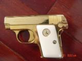Colt Vest
Pocket 1908 25 cal, hammerless, just refinished in bright 24K gold plating,bonded ivory grips,made in 1918,a true showpiece - 6 of 15