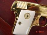Colt Vest
Pocket 1908 25 cal, hammerless, just refinished in bright 24K gold plating,bonded ivory grips,made in 1918,a true showpiece - 4 of 15
