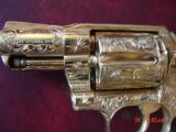 Colt Detective Special 2 1/8",fully engraved & 24K plated by Flannery Engraving,custom wood grips, 1973,38 Spl. awesome work of art
- 3 of 15