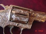 Colt Detective Special 2 1/8",fully engraved & 24K plated by Flannery Engraving,custom wood grips, 1973,38 Spl. awesome work of art
- 7 of 15