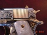 Colt 1911 45,fully refinished in bright nickel with 24K gold accents,2 mags,Pearlite grips,Master engraved by Santiago Leis,awesome work of art !! - 9 of 15