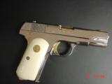 Colt 1903,32 acp, fully refinished in bright mirror nickel with 24K gold accents,& 1 gold mag,bonded ivory grips, made 1920, awesome showpiece !! - 13 of 15