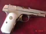 Colt 1903,32 acp, fully refinished in bright mirror nickel with 24K gold accents,& 1 gold mag,bonded ivory grips, made 1920, awesome showpiece !! - 4 of 15