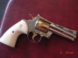 Colt Python 1960,4" fully refinished in bright nickel with 24K gold accents,bonded ivory grips,357 magnum,nicer in person. awesome showpiece !! - 5 of 15