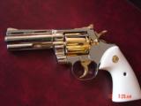 Colt Python 1960,4" fully refinished in bright nickel with 24K gold accents,bonded ivory grips,357 magnum,nicer in person. awesome showpiece !! - 1 of 15