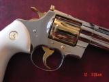 Colt Python 1960,4" fully refinished in bright nickel with 24K gold accents,bonded ivory grips,357 magnum,nicer in person. awesome showpiece !! - 7 of 15