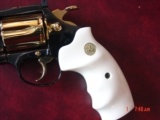 Colt Diamondback 4",38SPL, fully refinished in mirror blue with 24K gold accents,bonded ivory grips,made in 1981,awesome showpiece !! - 2 of 15