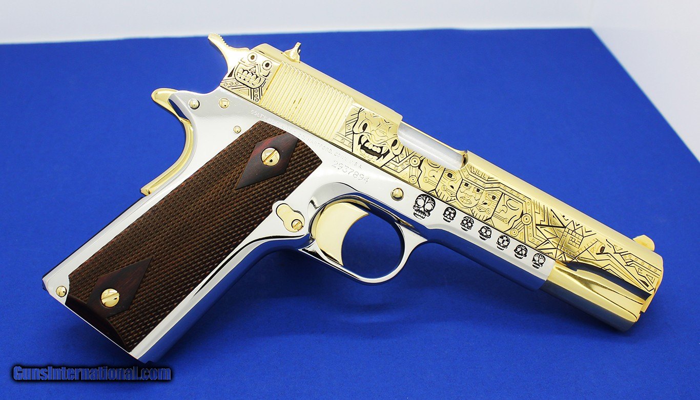 Colt-1911-deep-engraved-refinished-nickel-with-24k-gold-accents-Mexican-Heritage-design-1-of-a-kind_101092986_621_FFDBCE5CFE6DD9F6.JPG