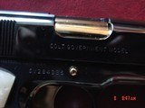 Colt Government,just refinished in bright mirror blue with 24K gold accents,45acp,5
