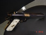 Colt Government,just refinished in bright mirror blue with 24K gold accents,45acp,5