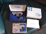 COP Derringer, 4 barrel,4 shots,357 mag/38spl., satin stainless,looks possibly never fired,box,manual,warranty card & serial #d sleeve,awesome power - 2 of 15