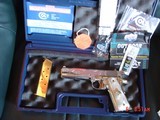 Colt Govt. 45,Master engraved by S.Leis,refinished in bright nickel with 24K accents,2 mags,Pearlite grips,certificate,case,manual,etc. awesome !! - 10 of 10