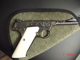 Colt Woodsman 22LR, 1950,master engraved by Jim Sornberger,reblued with 24k gold accents,gold wire inlays & real ivory grips,rare 4" barrel,aweso - 13 of 15
