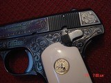 Colt 1903,32Cal,Hammerless,circa 1921,fully refinished bright blue & master engraved by S.Leis,certificate,bonded ivory grips,& way nicer in person.!! - 2 of 15