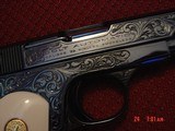 Colt 1903,32Cal,Hammerless,circa 1921,fully refinished bright blue & master engraved by S.Leis,certificate,bonded ivory grips,& way nicer in person.!! - 9 of 15