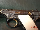 Colt Woodsman 1936, Jim Sornberger engraved,6 1/2",deep relief with 24k wire inlay & gold fox with rabbit,real ivory grips,signed,nicer than phot - 11 of 15
