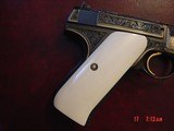 Colt Woodsman 1st series,engraved by Jim Sornberger,24K inlays, bald Eagle,real ivory grips,22LR,6 1/2" 1931,awesome 1 of a kind masterpiece !! - 15 of 15