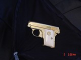 1908 Vest Pocket 25 caliber,just fully refinished in bright 24K gold,bonded ivory grips,awesome looking !! - 13 of 15