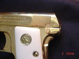 1908 Vest Pocket 25 caliber,just fully refinished in bright 24K gold,bonded ivory grips,awesome looking !! - 8 of 15