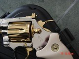 Colt Diamondback rare 2/12"barrel,1976,just refinished in mirror nickel
& 24K gold accents,custom grips,awesome showpiece !! - 7 of 15