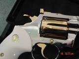 Colt Diamondback rare 2/12"barrel,1976,just refinished in mirror nickel
& 24K gold accents,custom grips,awesome showpiece !! - 4 of 15