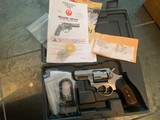 Ruger SP101, deep engraved,stainless,6 moon clips , wood & rubber grips, 2 1/4",357 mag , box ,papers etc. - 4 of 11