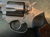 Ruger SP101, deep engraved,stainless,6 moon clips , wood & rubber grips, 2 1/4",357 mag , box ,papers etc. - 10 of 11