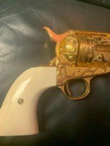 Colt SAA 1906, 1st Gen.,fully master engraved by Flannery,24k plated in rare CattleBrand real ivory grips, 32WCF/32-20, 5 1/2"-