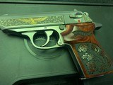 Walther PPK/S Gold Eagle, engraved, 1 of 400, Rosewood engraved grips, never fired, 380acp,case & papers
