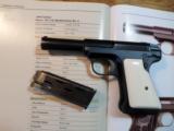 Savage 1917 model 380 ACP, blue with real old ivory grips & book
- 1 of 4