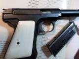 Savage 1917 model 380 ACP, blue with real old ivory grips & book
- 3 of 4