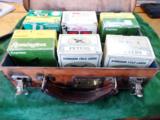 Six full boxes of vintage 20ga. shotgun shells, Peters, etc. with a vintage leather case- 1 of 3