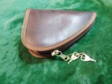 Lined leather pistol pouch with lock & keys made by North American Arms - 1 of 2