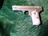 Colt 1908 Mod. 380 Cal. Mfg. 1922, Original Nickel and Mother-of-peal grips - 1 of 9
