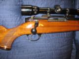 Weatherby Mark V Deluxe .300 WBY 4 x 40 Bushell Scope 24