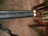 Browing 725 12ga , adjustable comb, 32" ported barrels and extended chokes, sporting rib - 10 of 13