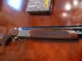 Browing 725 12ga , adjustable comb, 32" ported barrels and extended chokes, sporting rib - 1 of 13