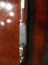 Browing 725 12ga , adjustable comb, 32" ported barrels and extended chokes, sporting rib - 7 of 13