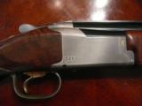 Browing 725 12ga , adjustable comb, 32" ported barrels and extended chokes, sporting rib - 3 of 13