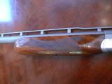 Stainless steel Ljutic 12 ga with three screw in Briley long choke tubes- 3 of 14