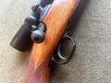 Pre-64 Winchester Mod 70 in 243 with Leupold 2.5-8X Vari-X III scope. - 2 of 13