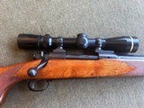 Pre-64 Winchester Mod 70 in 243 with Leupold 2.5-8X Vari-X III scope. - 1 of 13